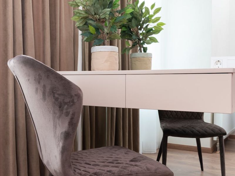 Bright workout space with wooden floors and green plants.